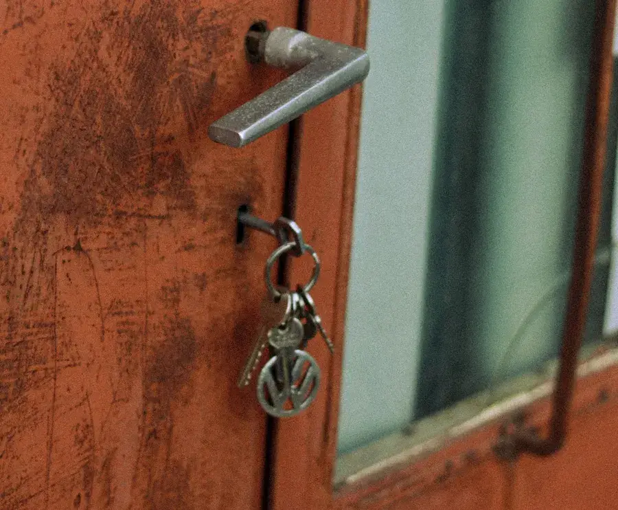 Keys hanging from the lock of an old door – why keys snap and when broken key removal Bournemouth is needed, Locksmith Bournemouth